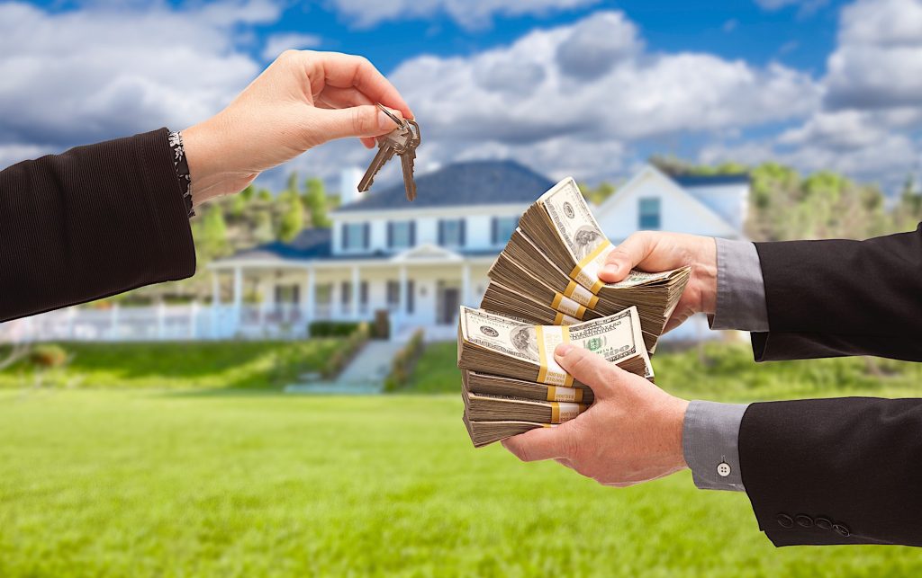 Man Handing Woman Thousands of Dollars For Keys in Front of House.